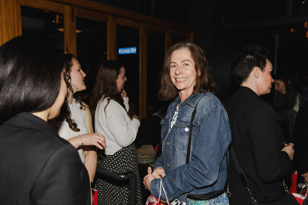 A guest smiling to camera during the Morrinsville networking evening