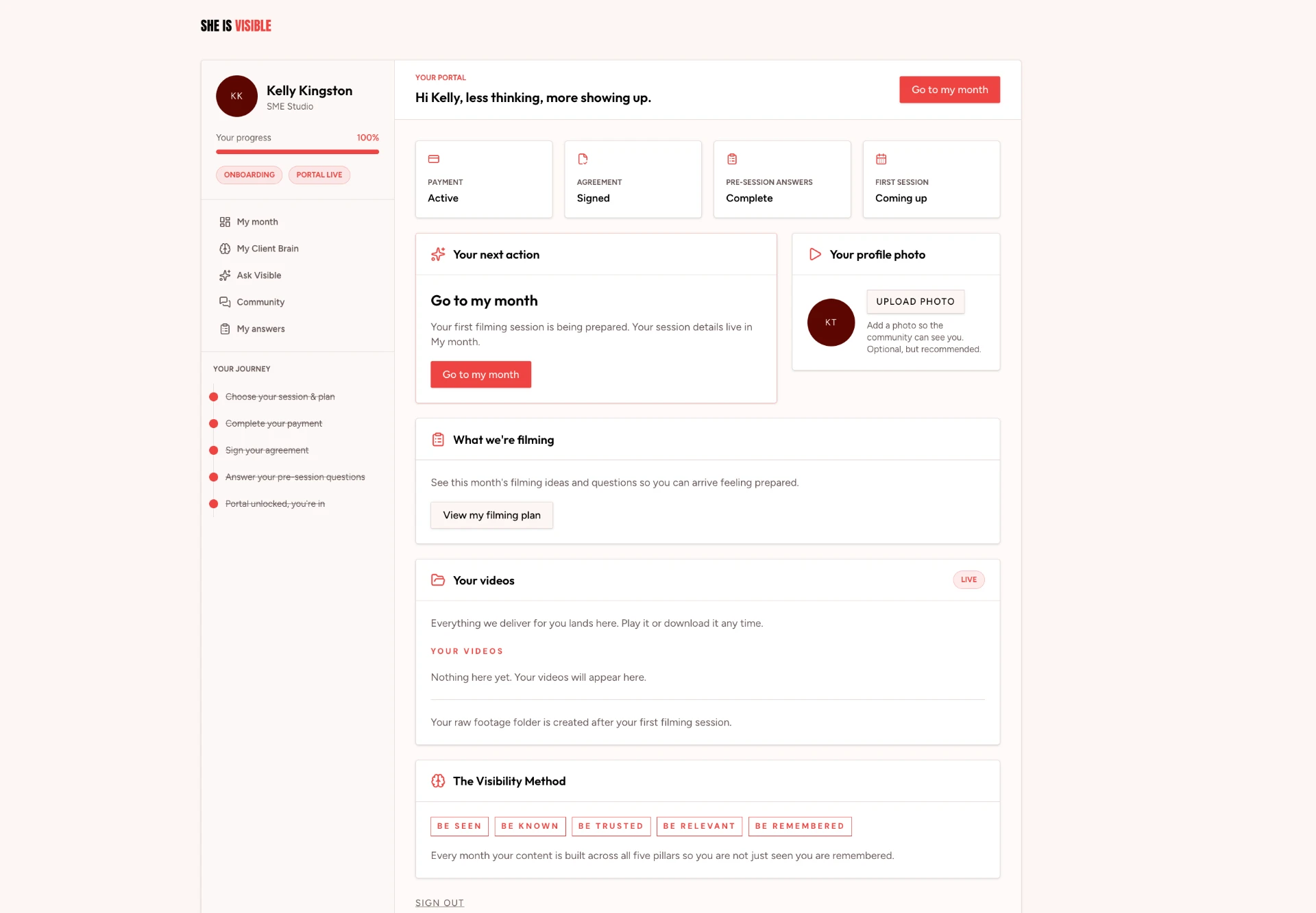 The She Is Visible client portal showing a member's progress, her next action, filming plan and delivered videos