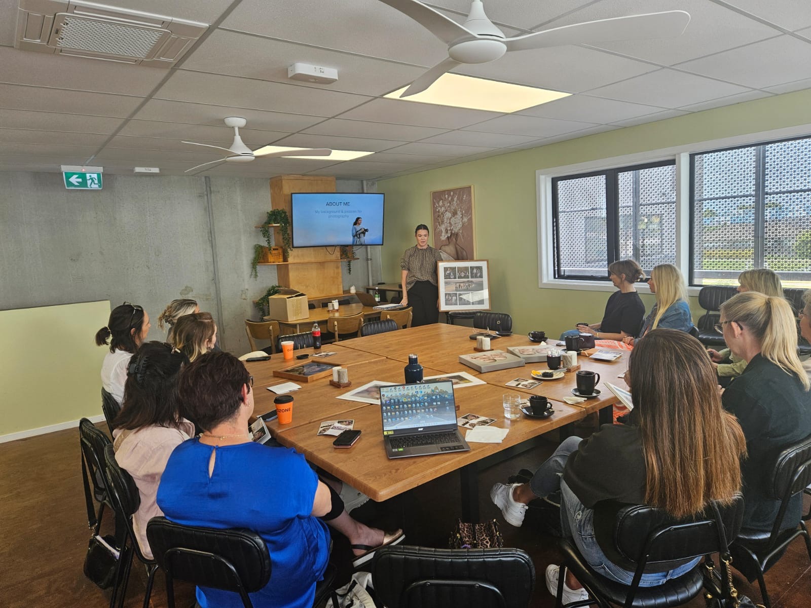 Women in business connecting in a room together