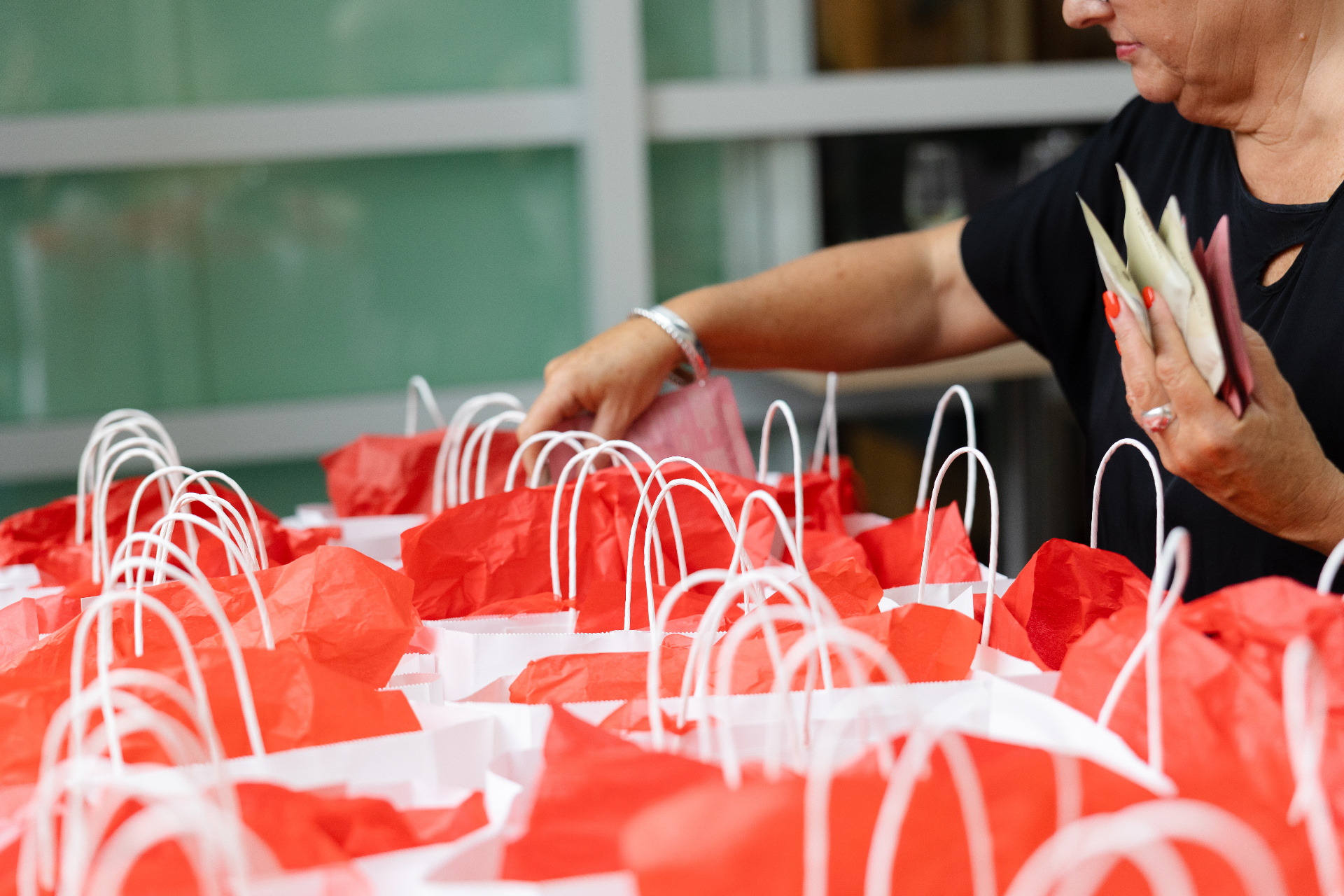 Final touches being added to the goodie bags
