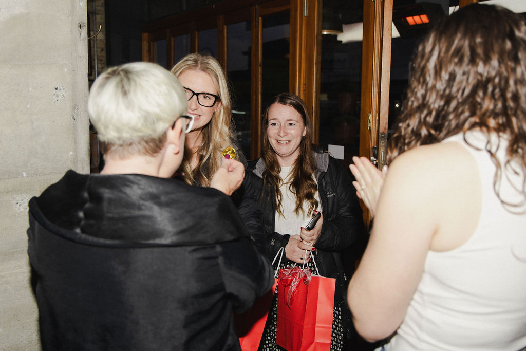 Guests smiling as prizes are drawn at the Morrinsville launch