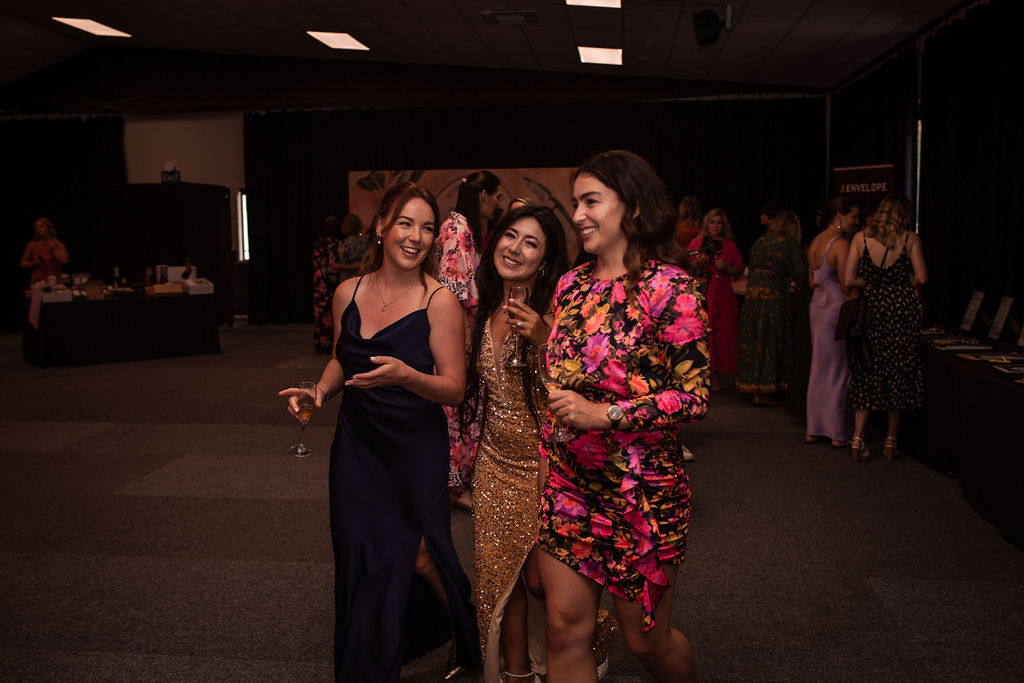 Two women in conversation at an SIU gathering