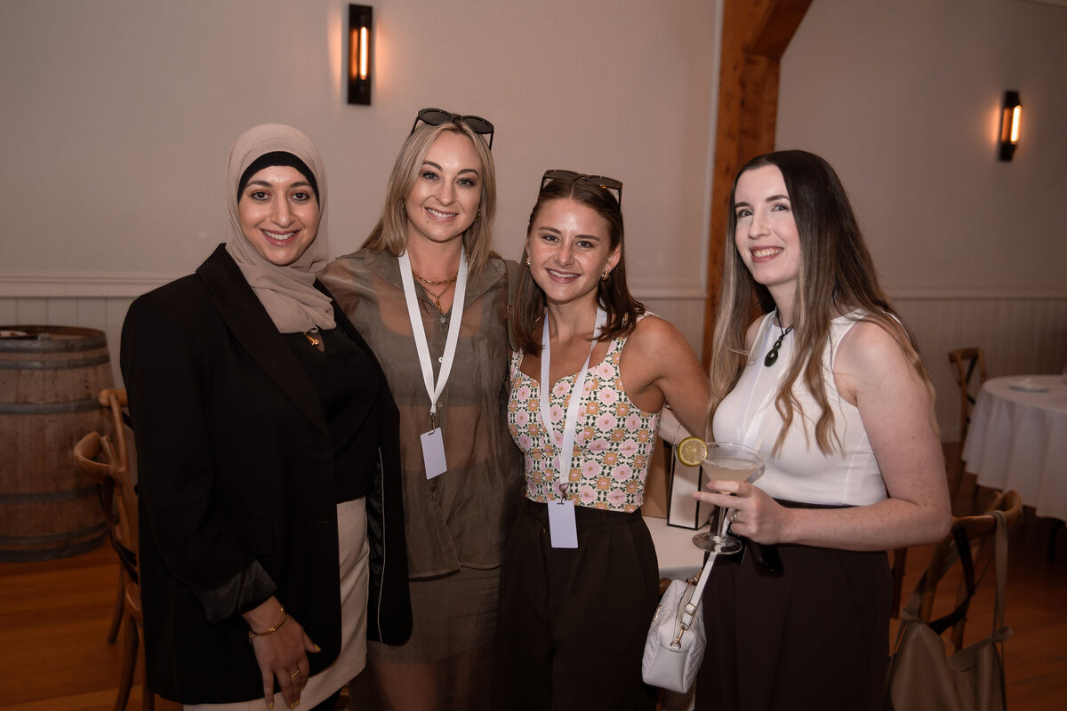 Group of attendees laughing together